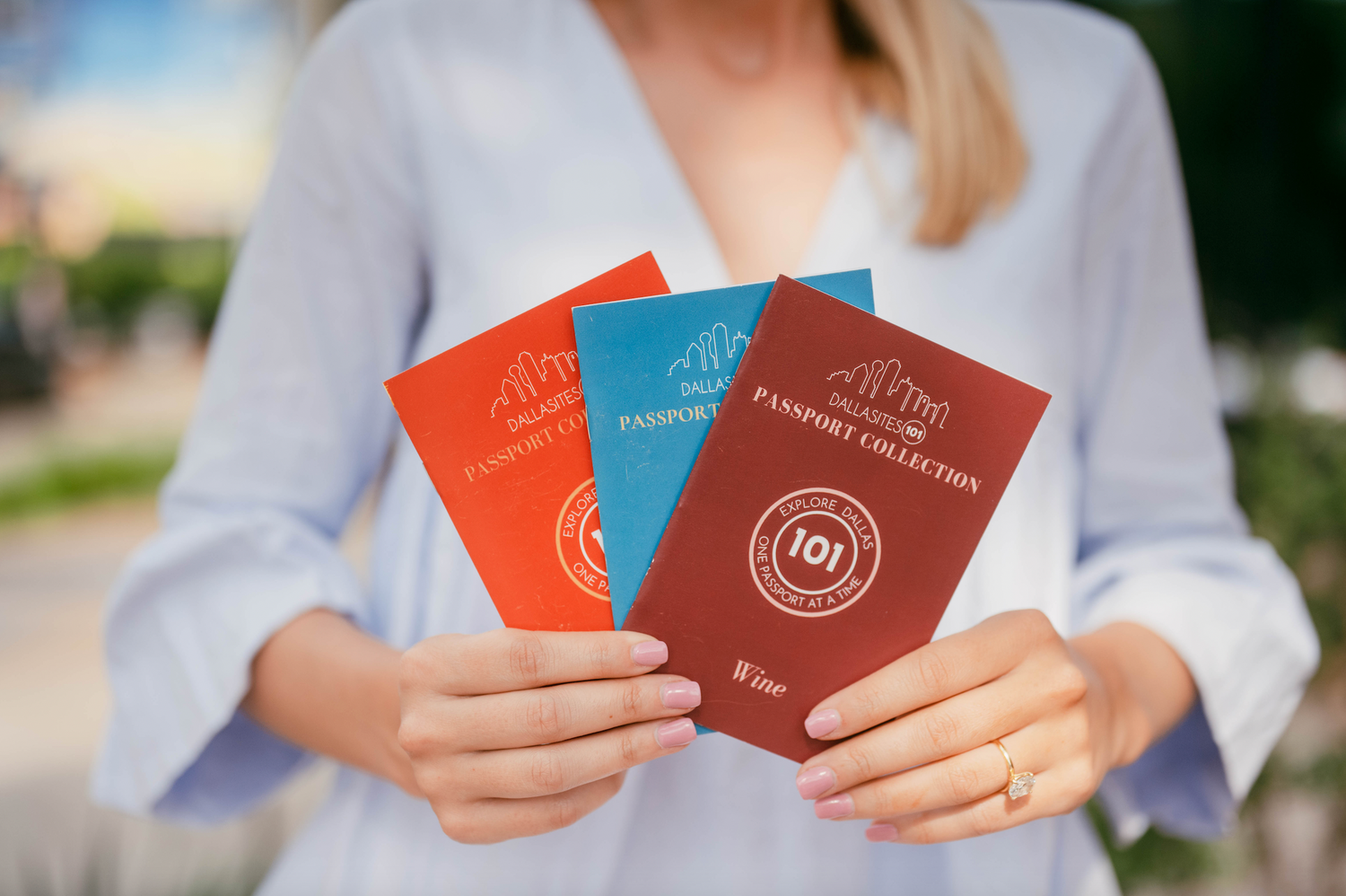 multiple passports in hand